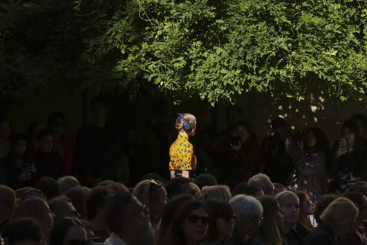 A model wears a creation as part of the Francesca Liberatore Spring/Summer 2026 collection presented in Milan, Italy, Sunday, Sept. 28, 2025. (AP Photo/Antonio Calanni)