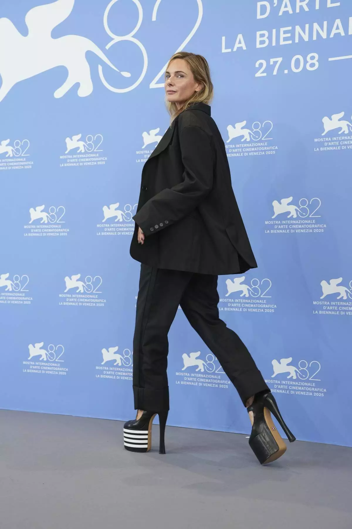 Rebecca Ferguson poses for photographers at the photo call for the film 'A House of Dynamite' during the 82nd edition of the Venice Film Festival in Venice, Italy, on Tuesday, Sept. 2, 2025. (Photo by Scott A Garfitt/Invision/AP)