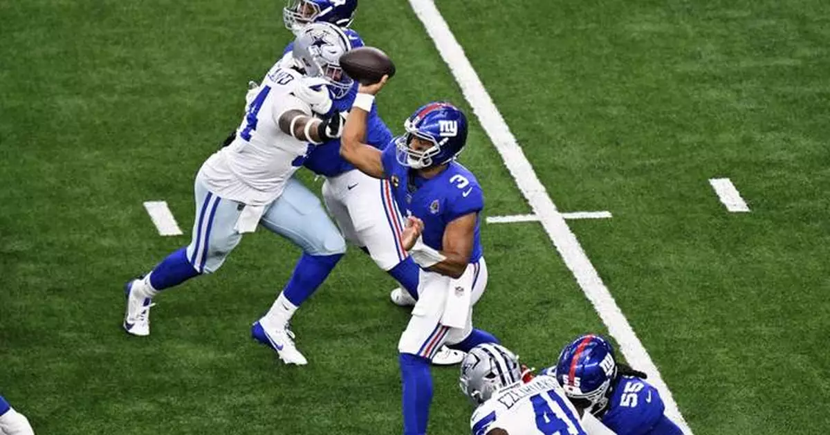 Penalty flags fly fast against Giants, who were set back 160 yards in overtime loss to Cowboys