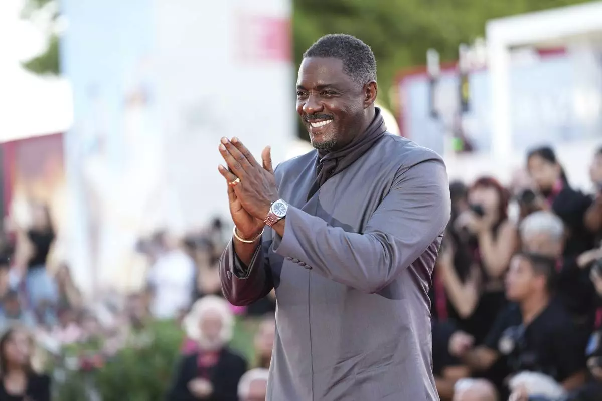 Idris Elba poses for photographers at the red carpet for the film 'A House of Dynamite' during the 82nd edition of the Venice Film Festival in Venice, Italy, on Tuesday, Sept. 2, 2025. (Photo by Scott A Garfitt/Invision/AP)