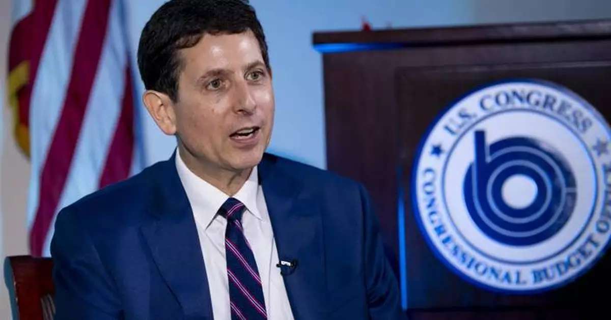 He's the budget scorekeeper for Congress. Lately, it's been a tough job