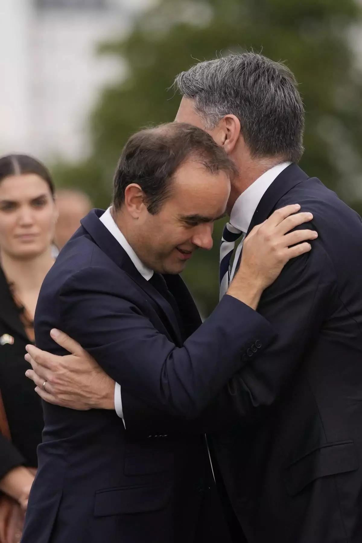 French Defense Minister Sebastien Lecornu, left, welcomes Deputy Prime Minister of Australia and Minister for Defense Richard Marles during a ceremony on Sept. 1, 2022, in Brest, Brittany, France. (AP Photo/Francois Mori, File)