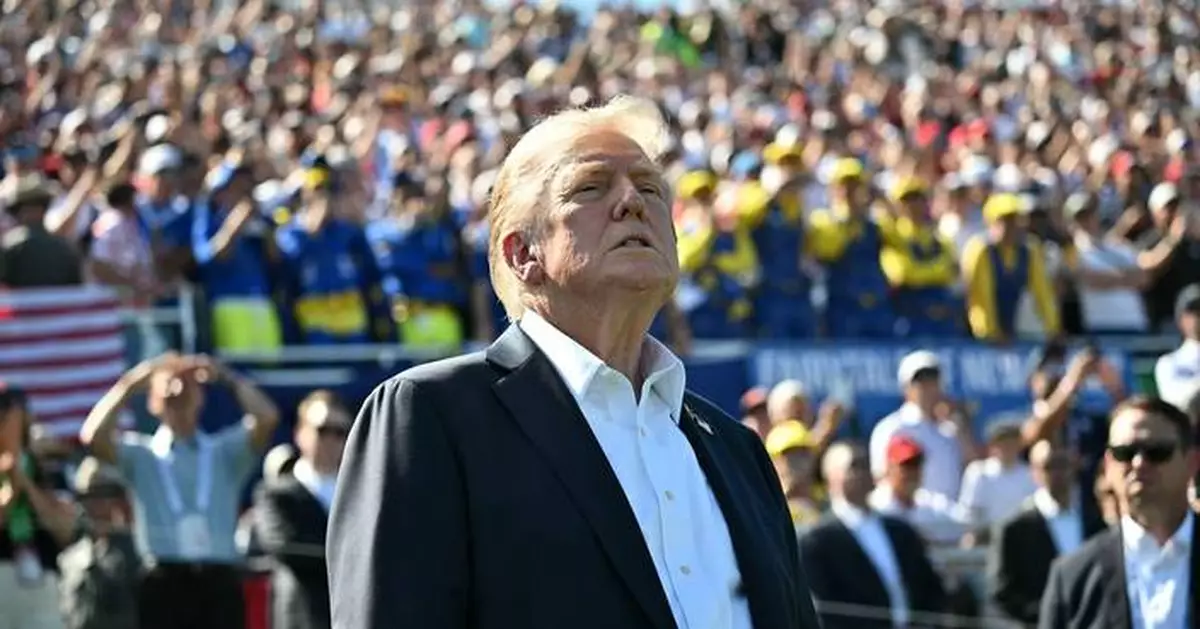 Trump swings by the Ryder Cup, soaking up fans’ love after vowing revenge on more of his enemies
