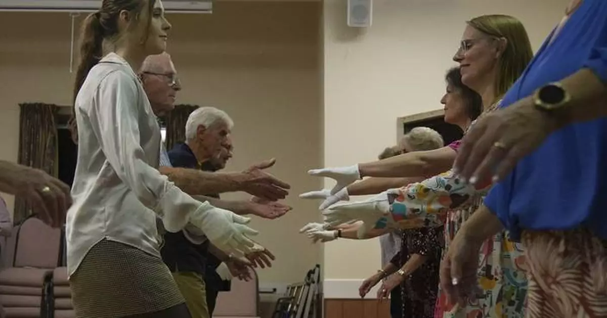 Jane Austen fans honor 250 years since her birth with grand costumed balls and dancing