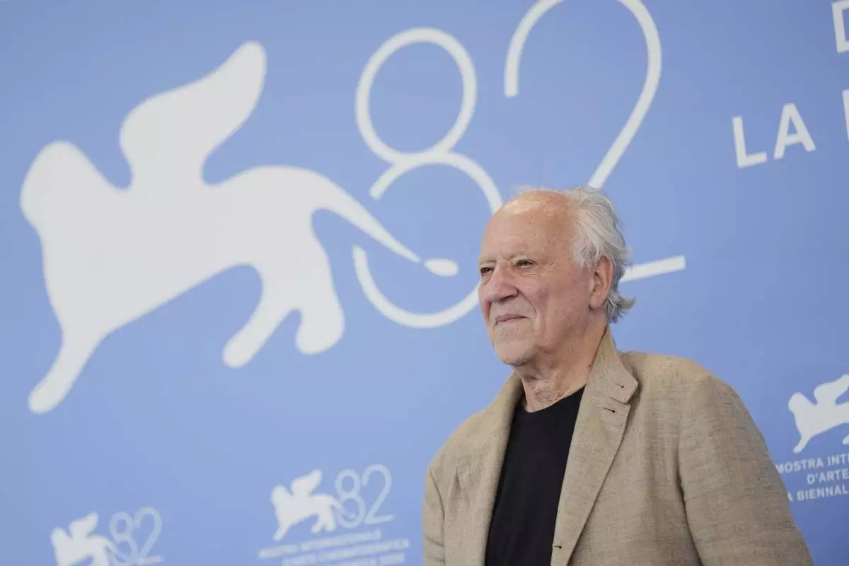 Werner Herzog poses for photographers during the Golden Lion for lifetime achievement photo call at the 82nd edition of the Venice Film Festival in Venice, Italy, on Thursday, Aug. 28, 2025. (Photo by Scott A Garfitt/Invision/AP)