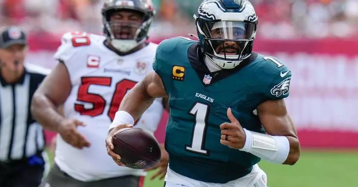 Fake tush push and special teams TD help Eagles beat Bucs 31-25 to stay undefeated