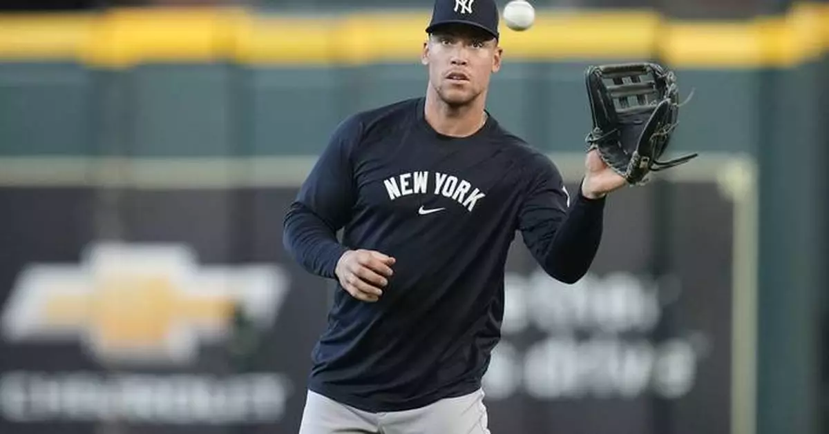 Aaron Judge throws gingerly in first outfield appearance since July 25, but insists arm is 100%