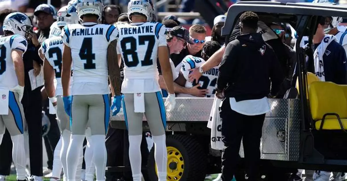 Panthers receiver David Moore carted off field with elbow injury on game's first play