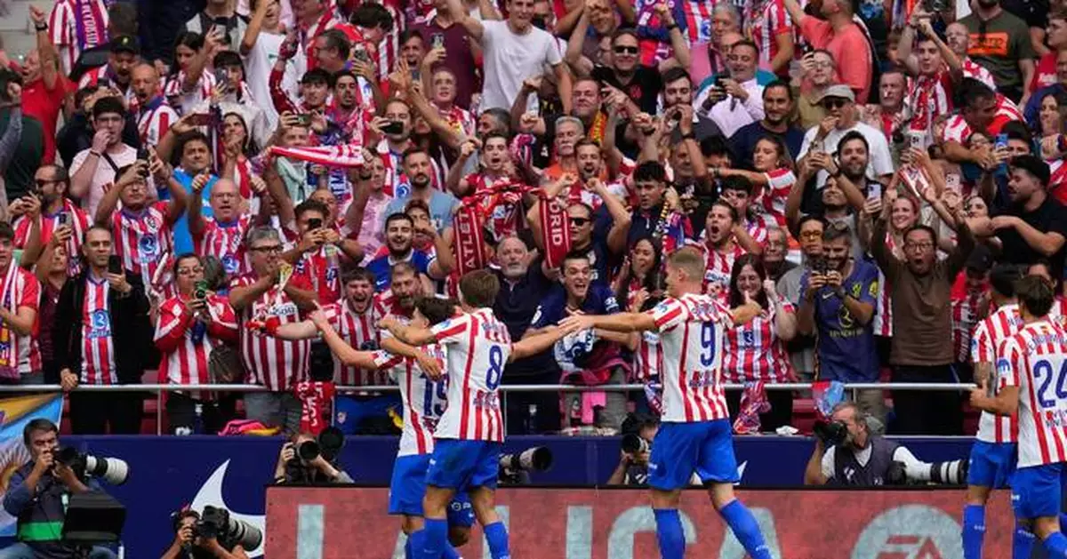 Álvarez nets twice as Atletico scores 5 against Real Madrid for first time in 75 years