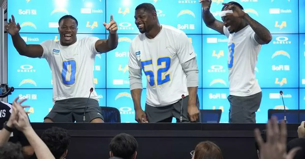 Chargers coach Jim Harbaugh say he's excited about the opportunity to play on 'a world stage'