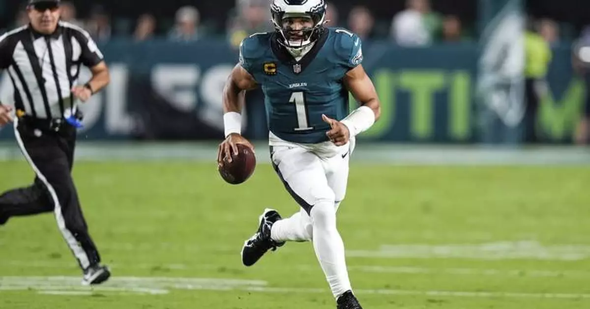 Defending champion Eagles edge Cowboys 24-20 in wild, lightning-delayed NFL season opener