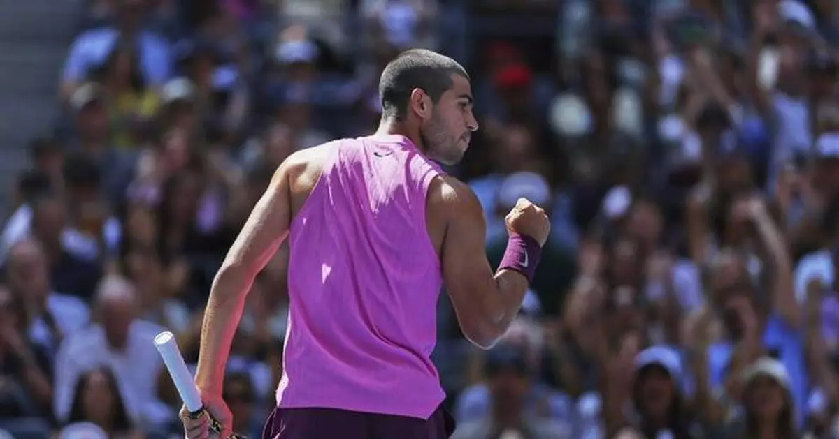 Carlos Alcaraz uses some behind-the-back magic to reach the US Open quarterfinals