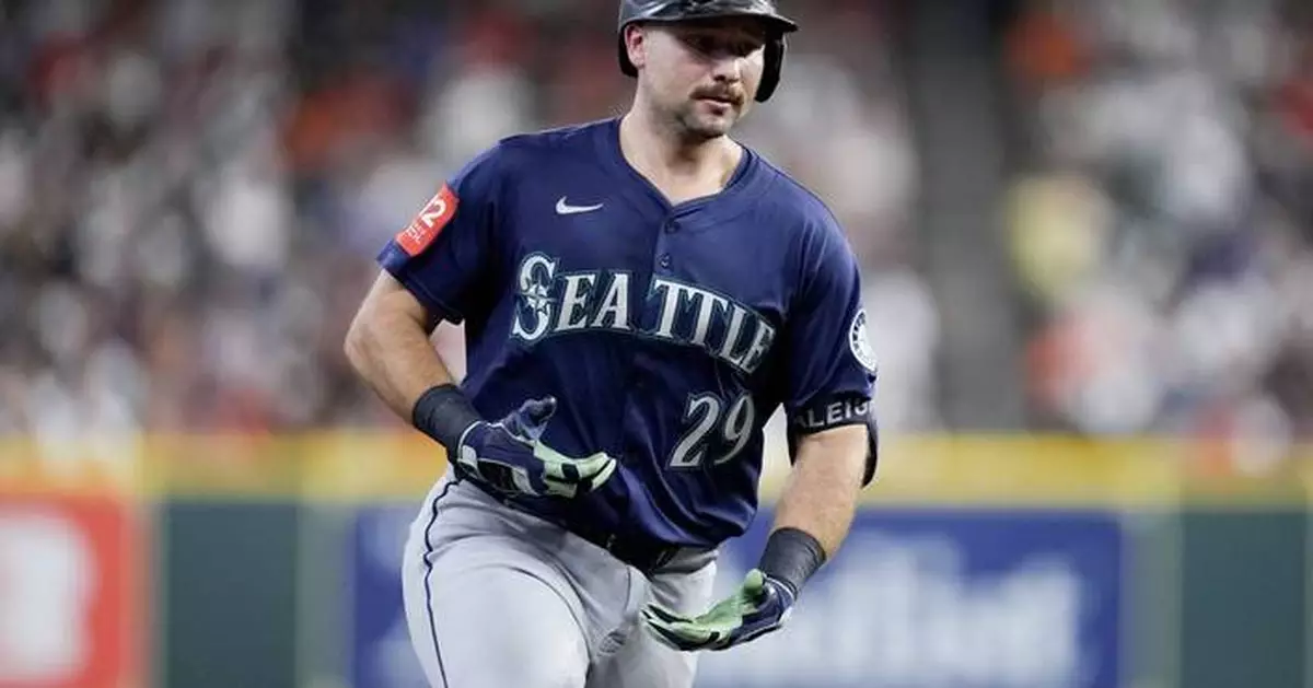 Seattle's Raleigh has record-setting home run ball personally delivered by Astros' staffer