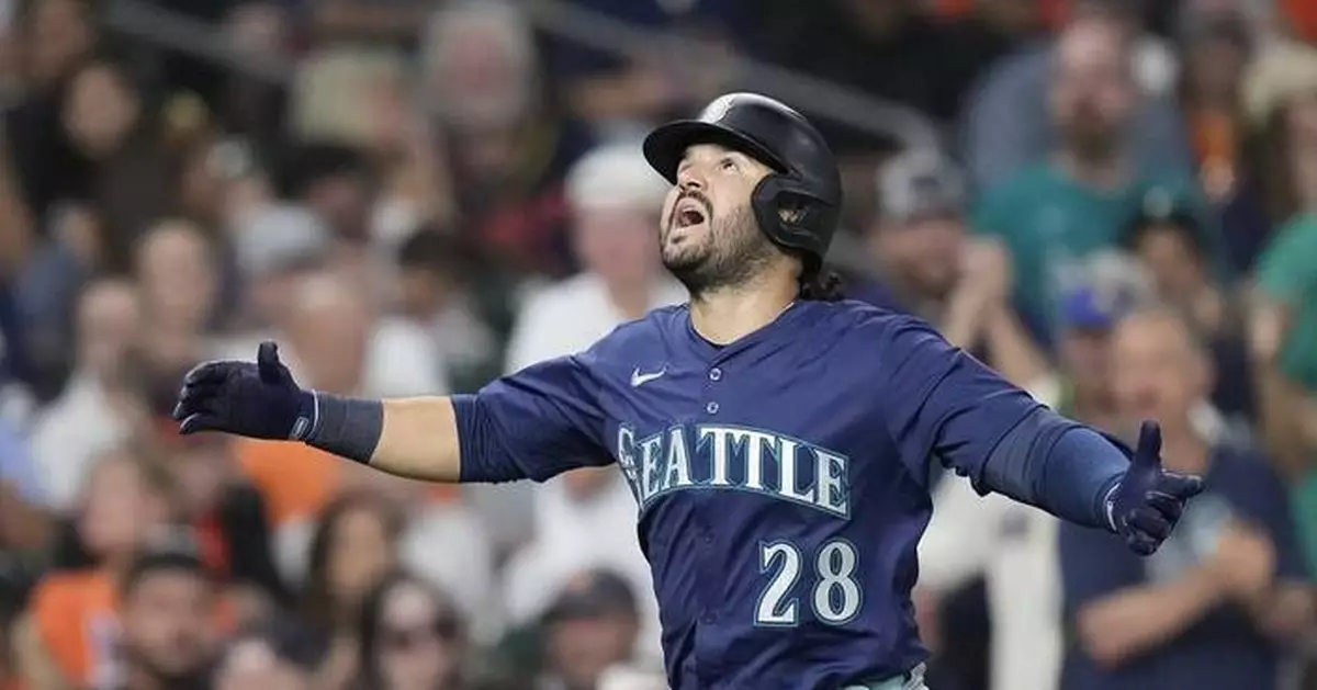 Suárez homers and Woo exits after 5 innings as Mariners beat Astros 4-0 to take over 1st in AL West