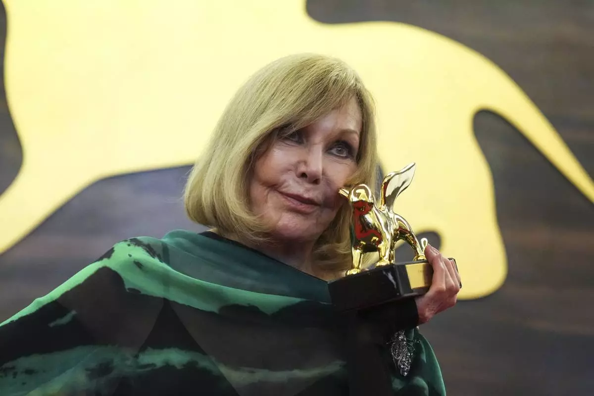 Kim Novak, recipient of the Golden Lion for lifetime achievement, poses for photographers during the 82nd edition of the Venice Film Festival in Venice, Italy, on Monday, Sept. 1, 2025. (Photo by Alessandra Tarantino/Invision/AP)