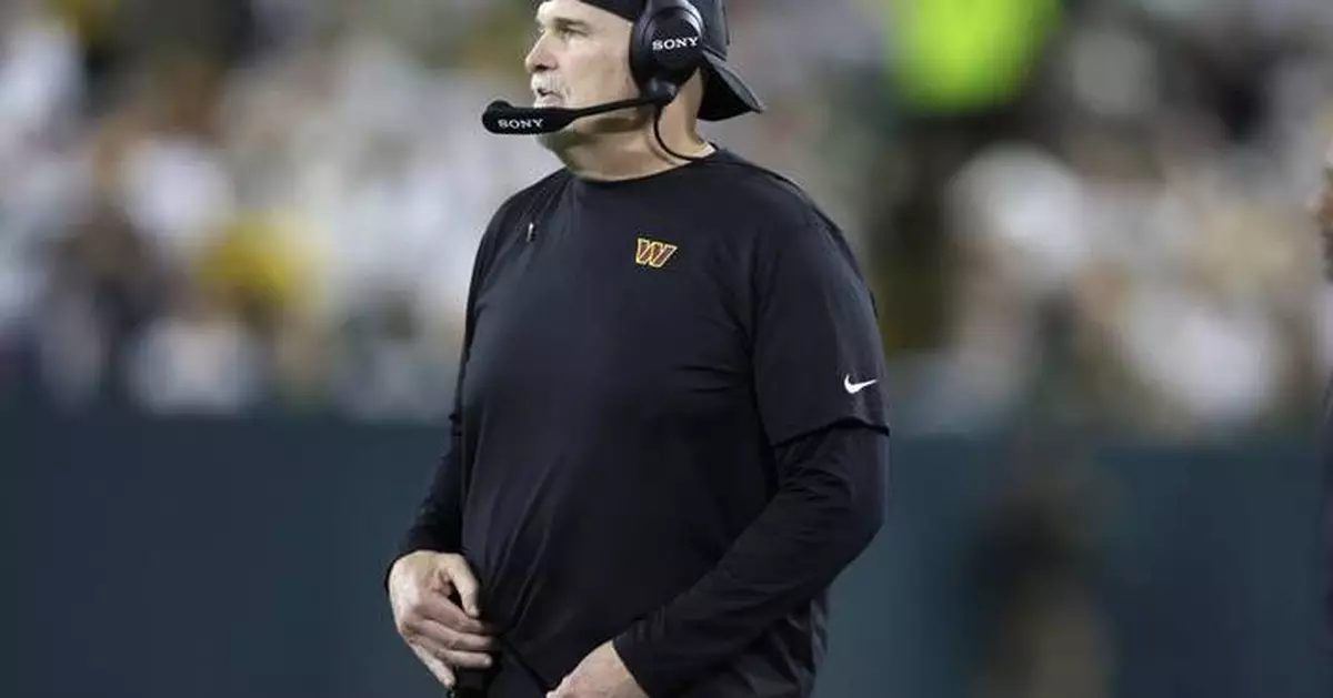 Commanders coach Dan Quinn bloodied in sideline collision with Marcus Mariota