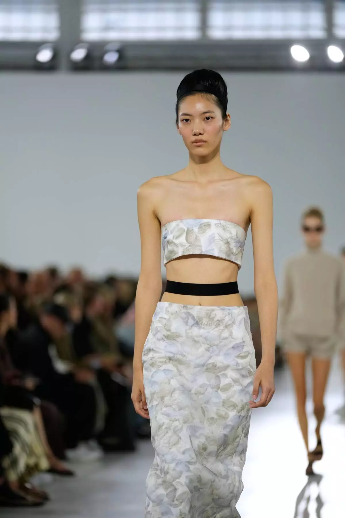 A model wears a creation part of the Max Mara women's Spring-Summer 2026 collection, presented in Milan, Italy, Thursday, Sept. 25, 2025. (AP Photo/Luca Bruno)