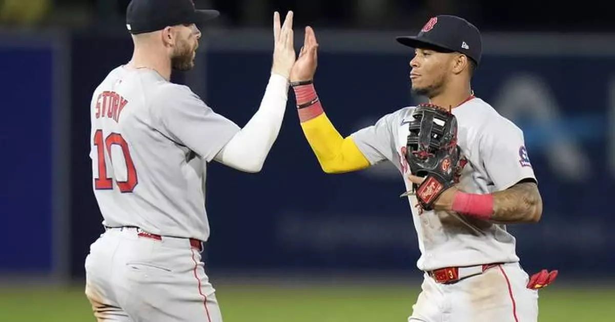 Story hits go-ahead single in 9th and Red Sox top Rays 6-3 to keep pace in playoff chase