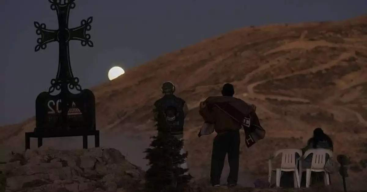 Photos show a lunar eclipse across Asia and Europe