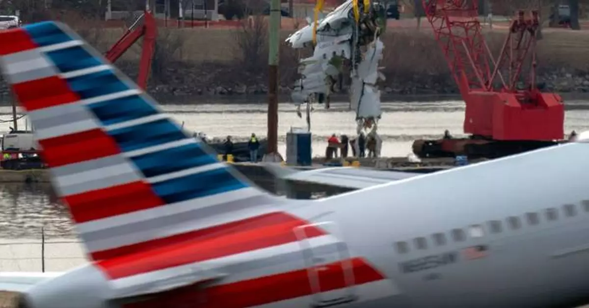 Family of 1 of the 67 Washington plane crash victims sues the FAA, Army and American Airlines