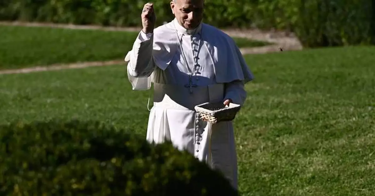 Pope feeds fish as he opens Vatican's ambitious model of sustainable farming and education