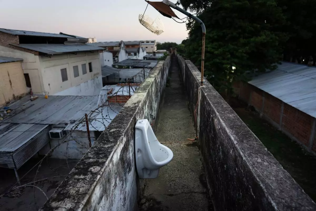 FILE PHOTO GALLERY - A urinal is located along an observation walkway for security guards at the Tacumbu prison in Asuncion, Paraguay, July 8, 2024. (AP Photo/Rodrigo Abd)