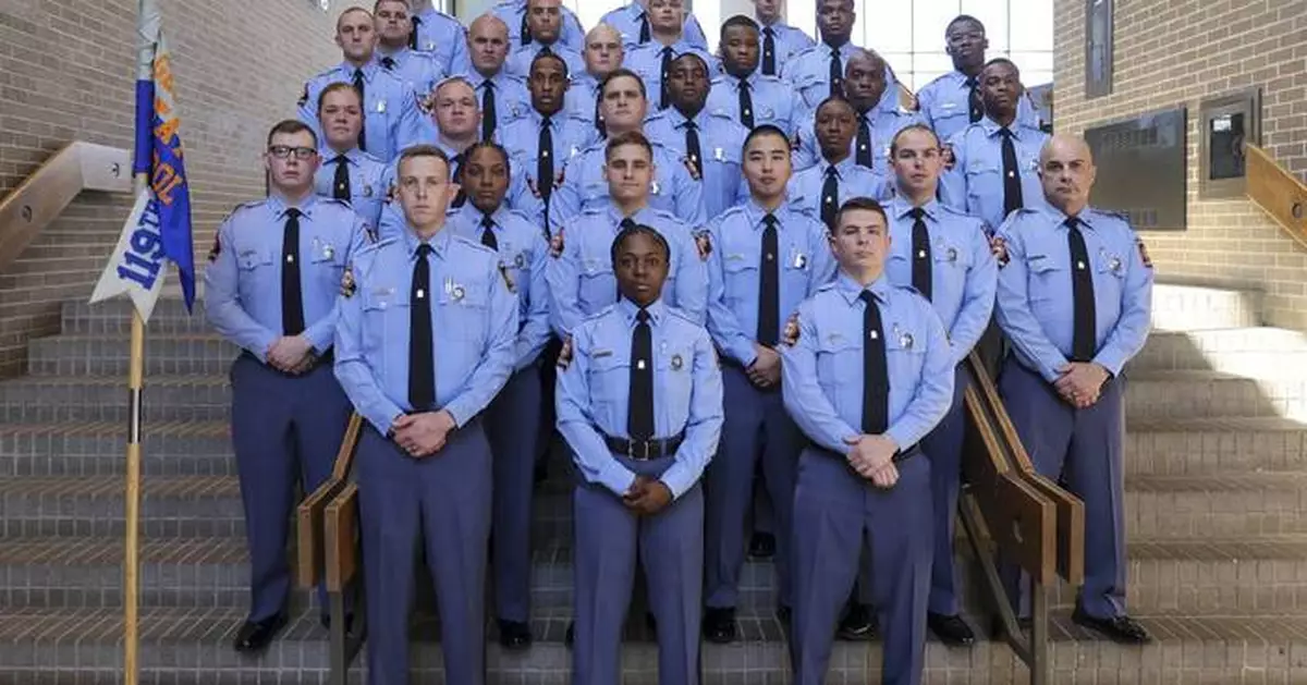 Georgia Gov. Brian Kemp swears in his daughter as a state trooper