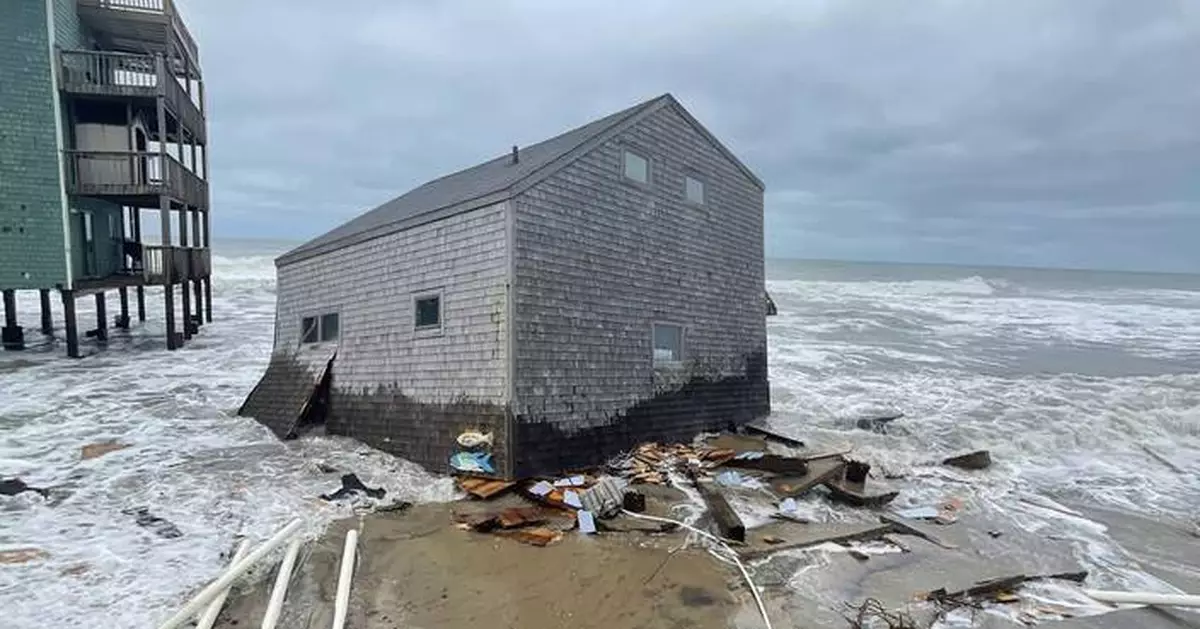 Another beachfront stilt house collapses into the surf on the Outer Banks