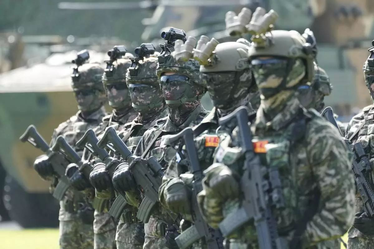 South Korean soldiers stand during the media day for the 77th anniversary of Armed Forces Day at the Gyeryong military headquarters in Gyeryong, South Korea, Monday, Sept. 29, 2025. (AP Photo/Lee Jin-man)