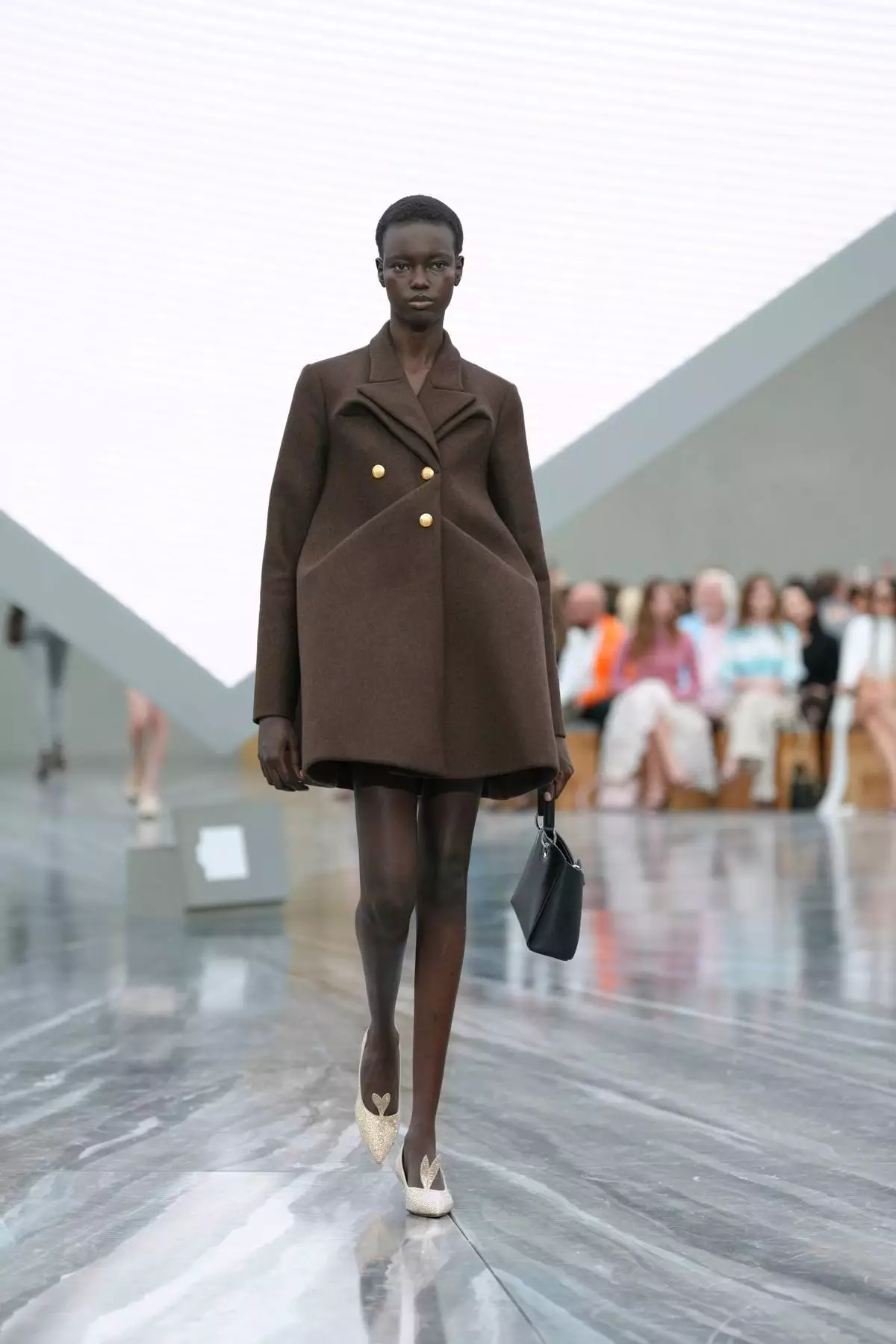 A model wears a creation as part of the Dior Spring/Summer 2026 collection presented in Paris, Wednesday, Oct. 1, 2025. (AP Photo/Aurelien Morissard)