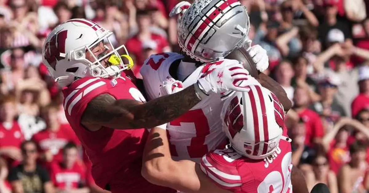 The Latest: Three ranked matchups in the AP Top 25 headline next weekend