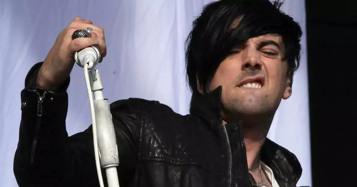 UK police arrest 2 in stabbing death of former Lostprophets singer in prison