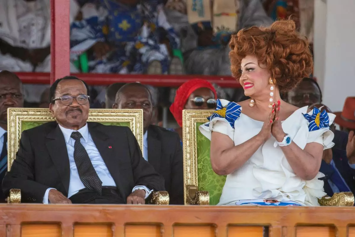 Cameroon's President Paul Biya and First Lady Chantal Biya attend a political rally at Lamido Yaya Dairou Stadium in Maroua, Cameroon, Tuesday, Oct. 7, 2025. (AP Photo/Welba Yamo Pascal)