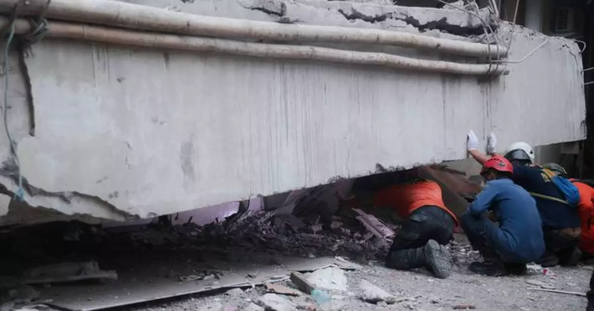 Indonesian rescuers race to find dozens of students in rubble of collapsed school