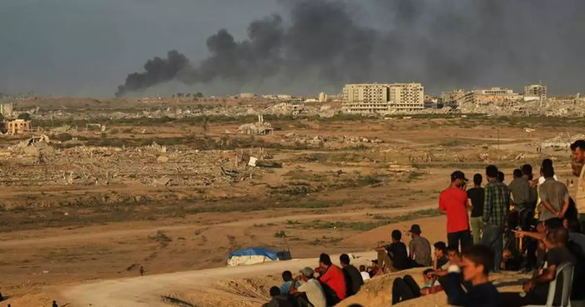 The Latest: Tens of thousands of Palestinians in Gaza return north as ceasefire takes effect