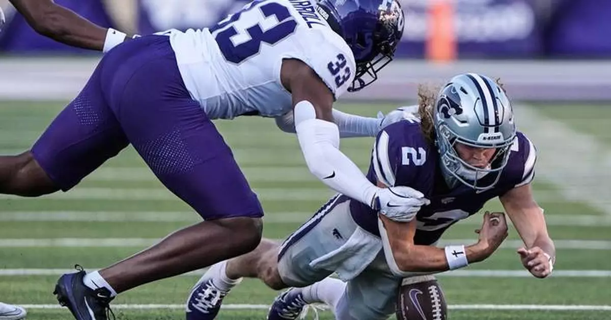 Avery Johnson's three TD passes and two defensive scores lift K-State over TCU 41-28