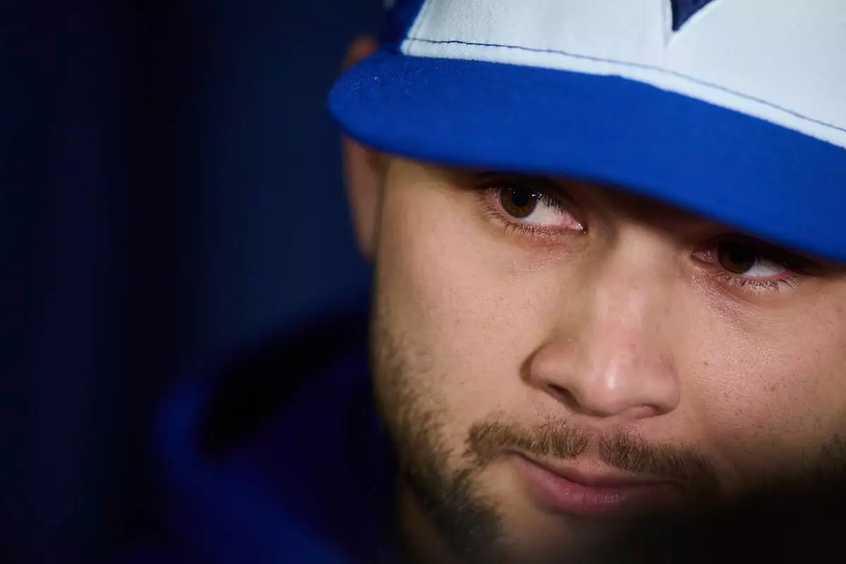 Toronto Blue Jays' Bo Bichette speaks to media during the Toronto Blue Jays' media day ahead of the 2025 World Series against the Los Angeles Dodgers in Toronto, on Thursday, Oct. 23, 2025. (Sammy Kogan/The Canadian Press via AP)