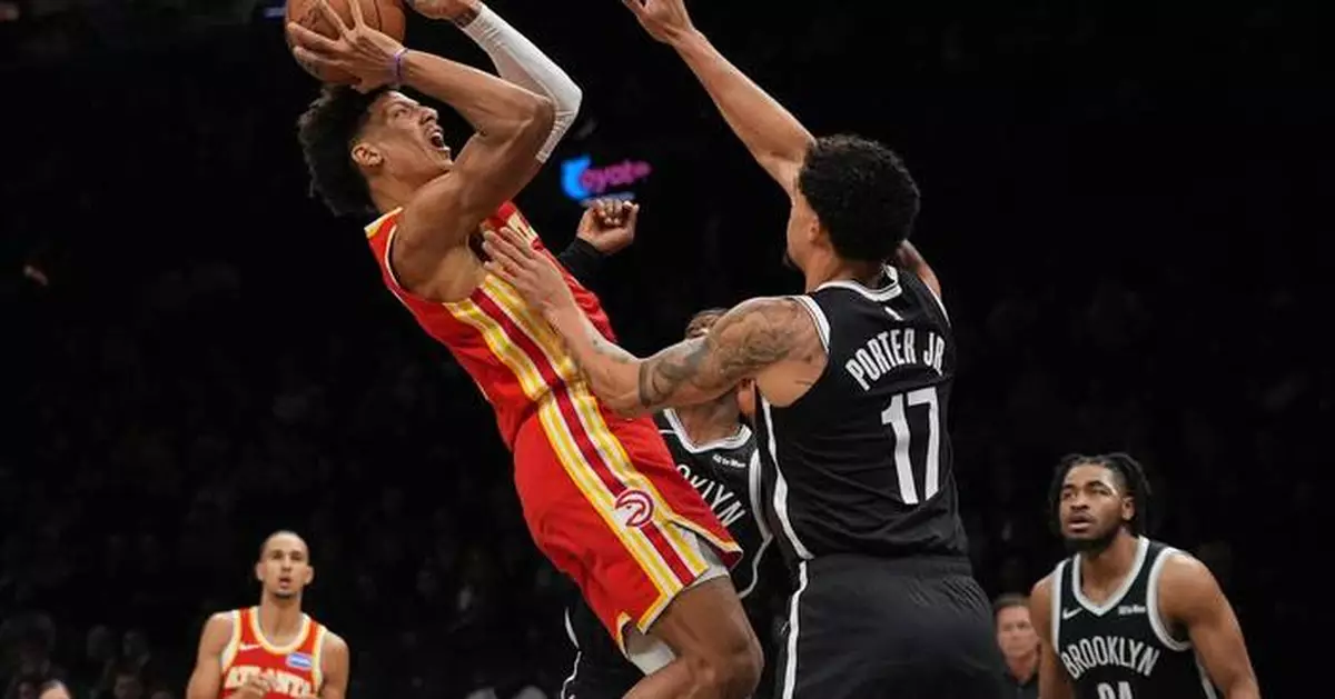 Jalen Johnson and Hawks hold off winless Nets 117-112 after Trae Young exits with knee injury