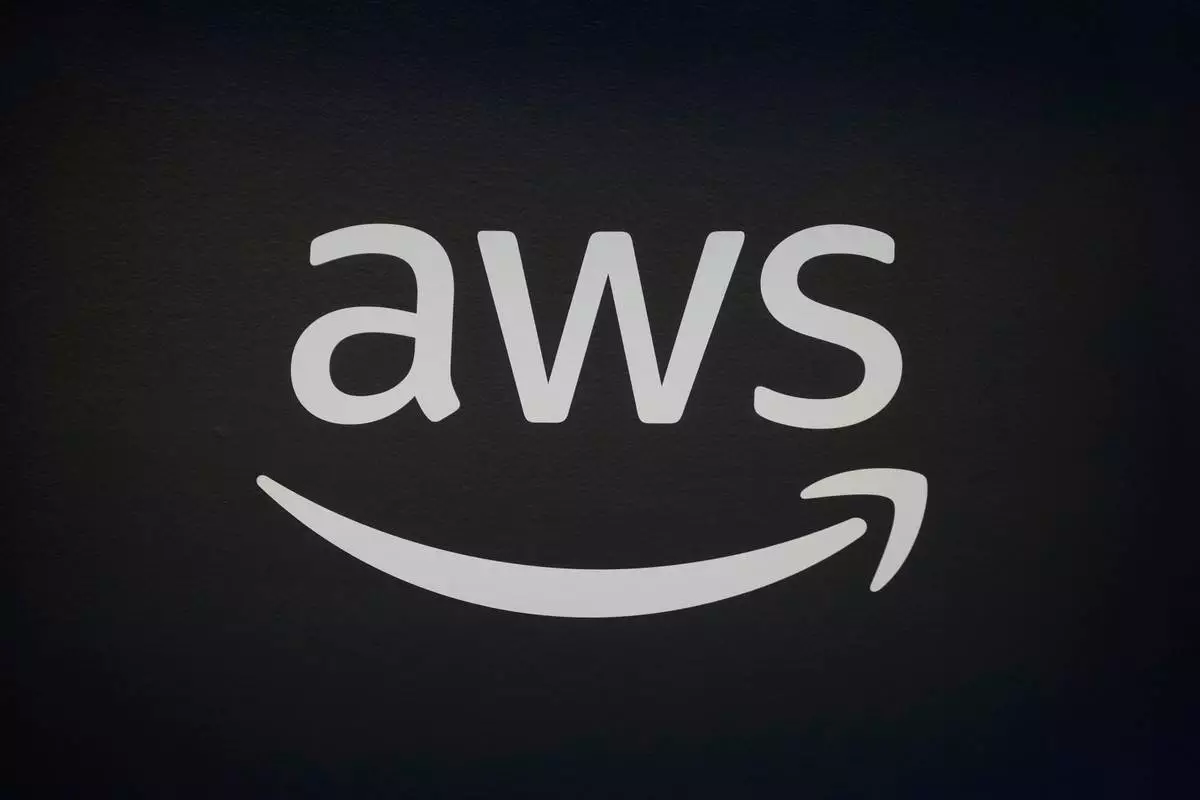 FILE - An AWS, Amazon Web Services, logo is displayed at LlamaCon 2025, an AI developer conference, in Menlo Park, Calif., Tuesday, April 29, 2025. (AP Photo/Jeff Chiu, File)
