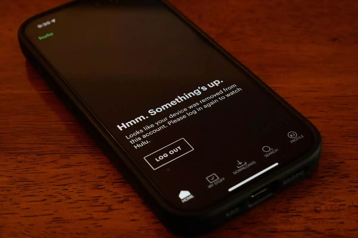 A Hulu mobile app shows it is not available during the Amazon Web Services outage, Monday, Oct. 20, 2025, in Chicago. (AP Photo/Kiichiro Sato)
