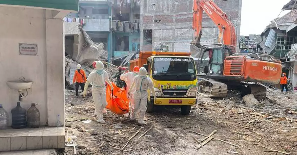 Indonesian rescuers search for missing students after school collapse kills 49