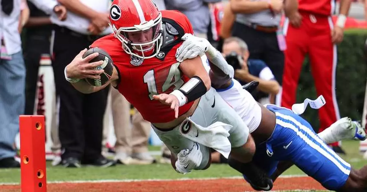 No. 12 Georgia bounces back from first loss of the season to beat Kentucky 35-14