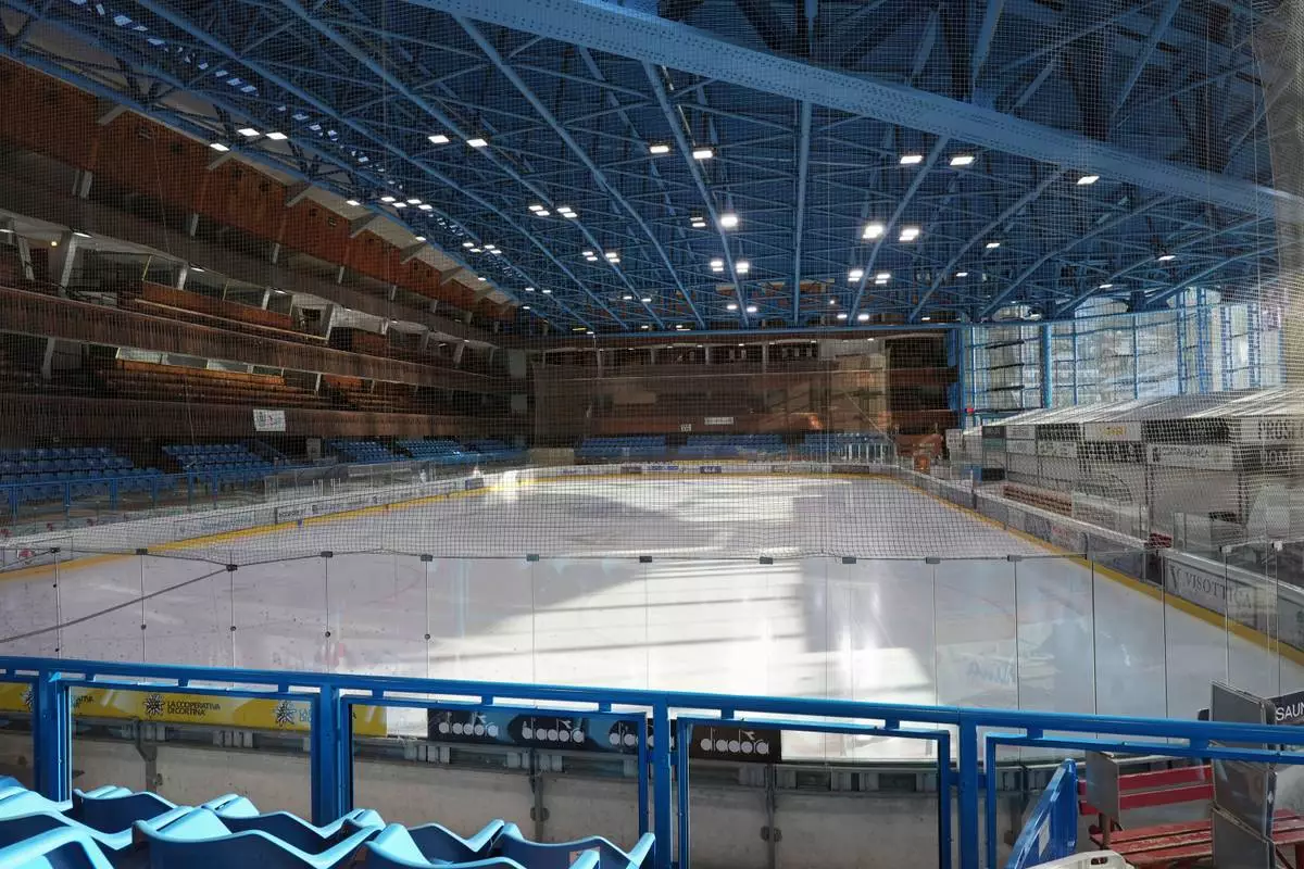FILE - A view of the Stadio Olimpico del Ghiaccio, which will be called Cortina Curling Olympic Stadium, venue for the curling discipline at the Milan Cortina 2026 Winter Olympics, in Cortina d'Ampezzo, Italy, Thursday, Jan. 16, 2025. (AP Photo/Giovanni Auletta, File)