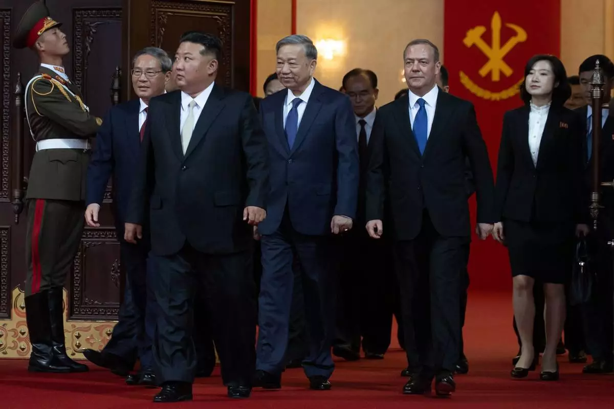 From left, Vietnamese Communist Party General Secretary To Lam, North Korean leader Kim Jong Un, Chinese Premier Li Qiang and Russian Security Council Deputy Chairman and the head of the United Russia party Dmitry Medvedev attend a reception marking the 80th anniversary of the ruling Workers' Party in Pyongyang, North Korea, Friday, Oct. 10, 2025. (Ekaterina Shtukina, Sputnik, Pool Photo via AP)
