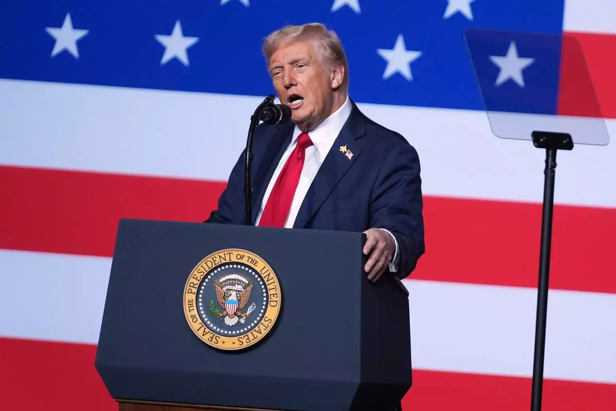 President Donald Trump speaks to a gathering of top U.S. military commanders at Marine Corps Base Quantico, Tuesday, Sept. 30, 2025, in Quantico, Va. (AP Photo/Evan Vucci)