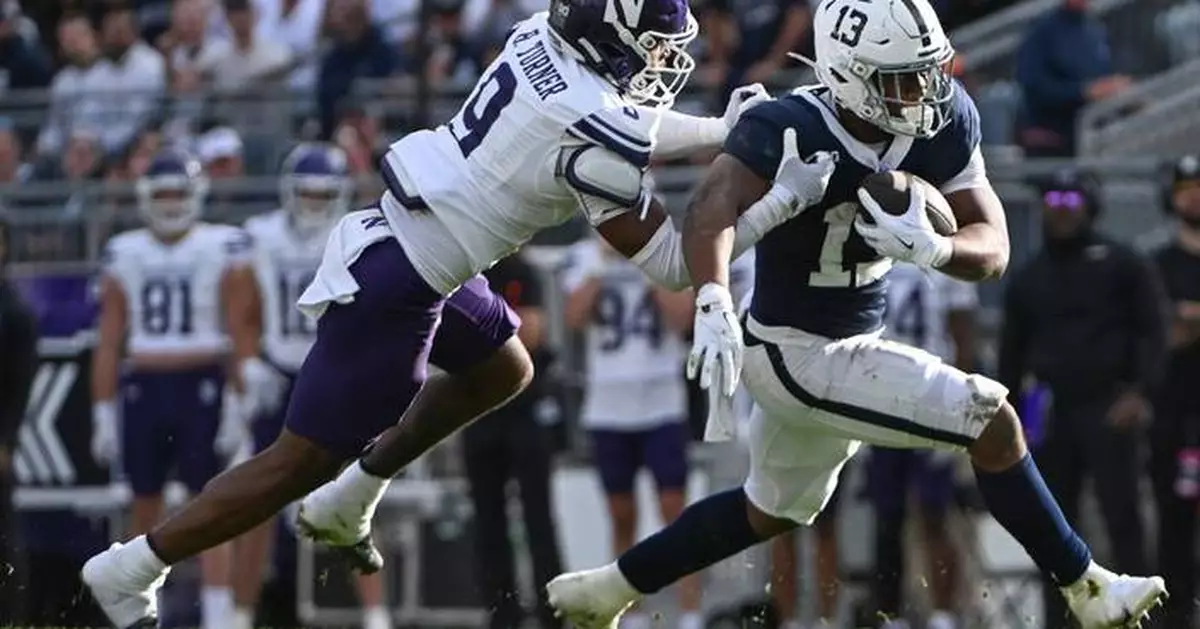 Komolafe scores late, leads Northwestern to 22-21 win over Penn State