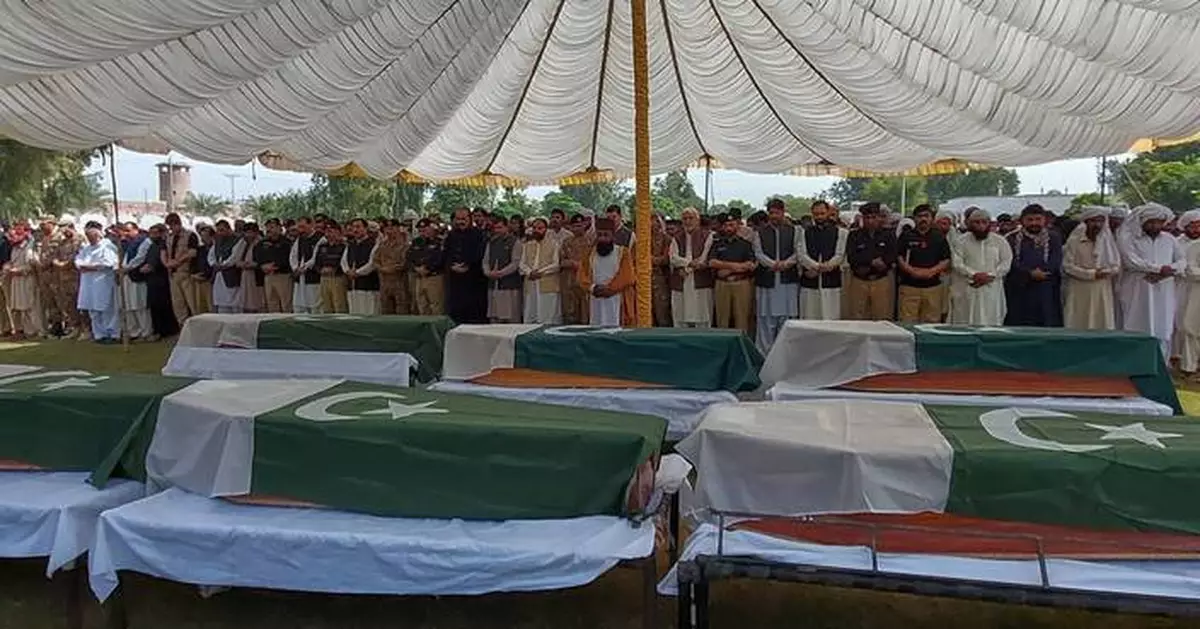 Militant attack on Pakistani police station kills at least 7 officers and wounds 13