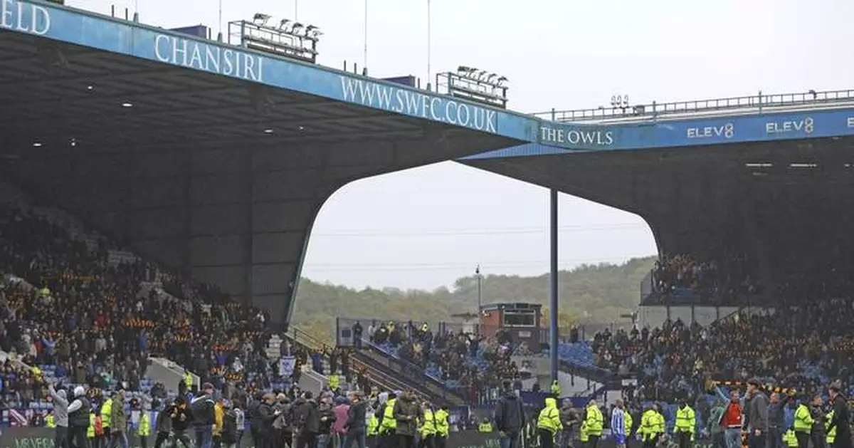 Sheffield Wednesday fans enter pitch to protest against club ownership