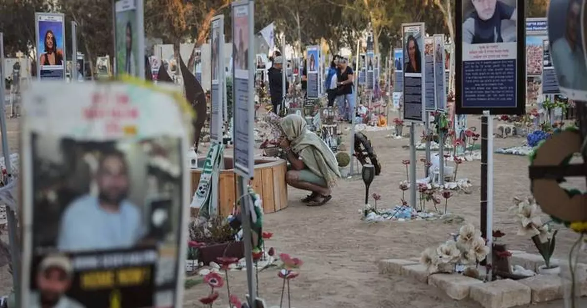 The Latest: Israelis and Palestinians mark 2 years of war