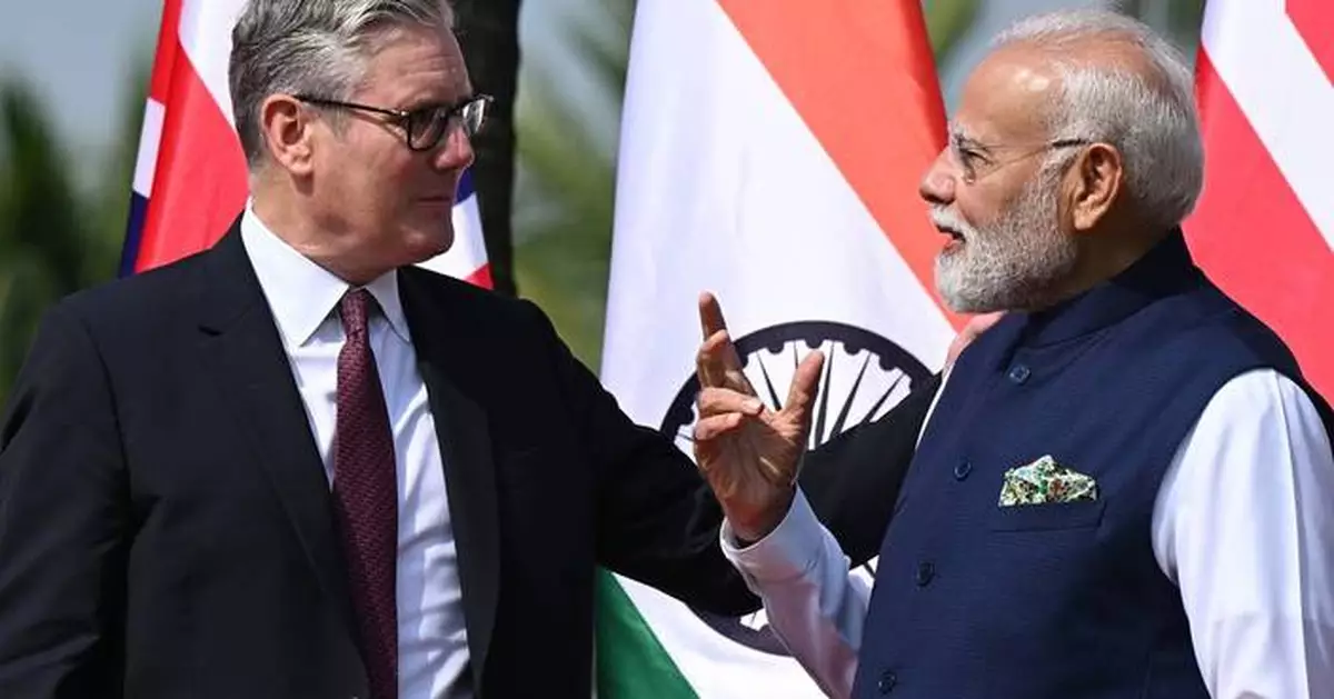 British and Indian prime ministers promote trade deal during visit by Starmer